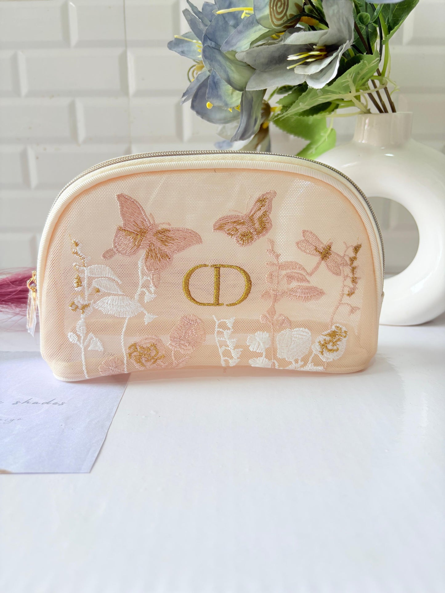 Dior butterfly mesh pouch