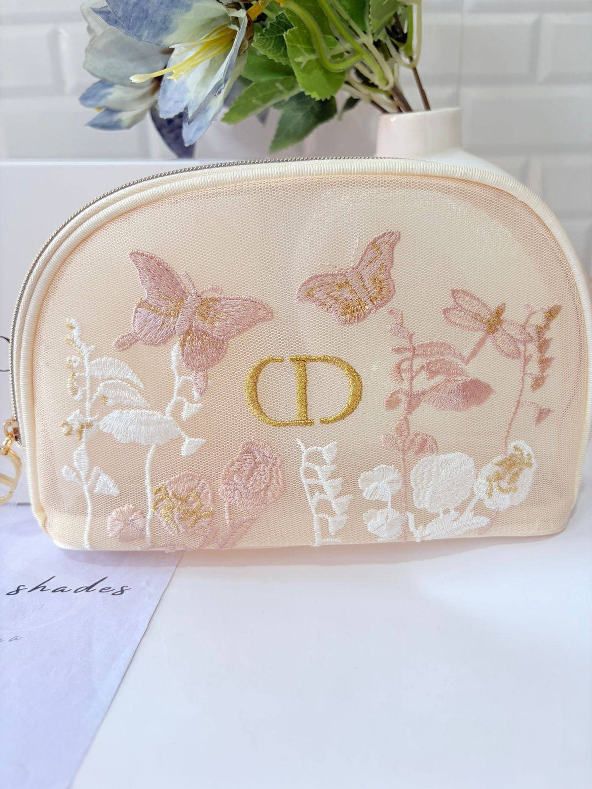 Dior butterfly mesh pouch