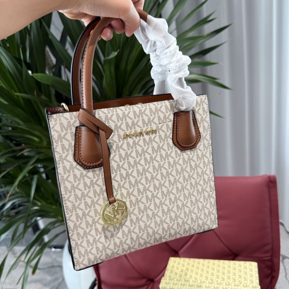 Michael Kors Cream and Brown
Satchel with Crossbody Strap