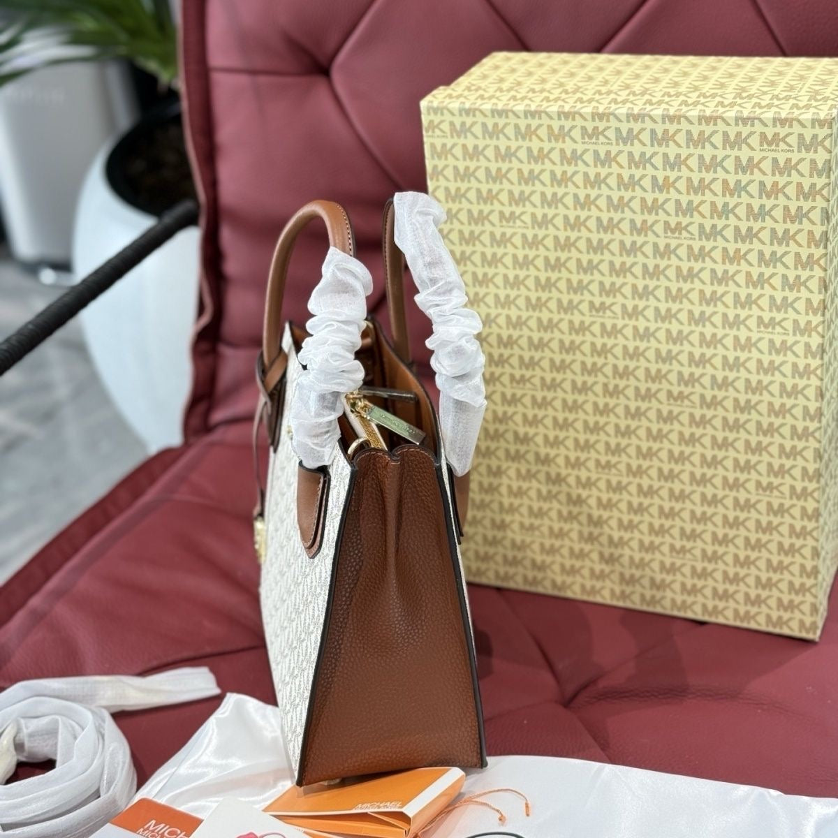 Michael Kors Cream and Brown
Satchel with Crossbody Strap