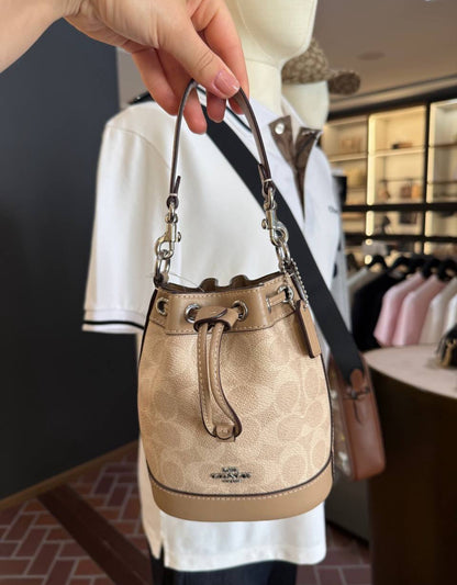 Coach Mini Bucket Bag In Signature Canvas