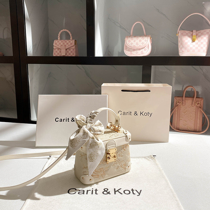 Carit & Koty Cream Embroidery Bag with Gold Lock