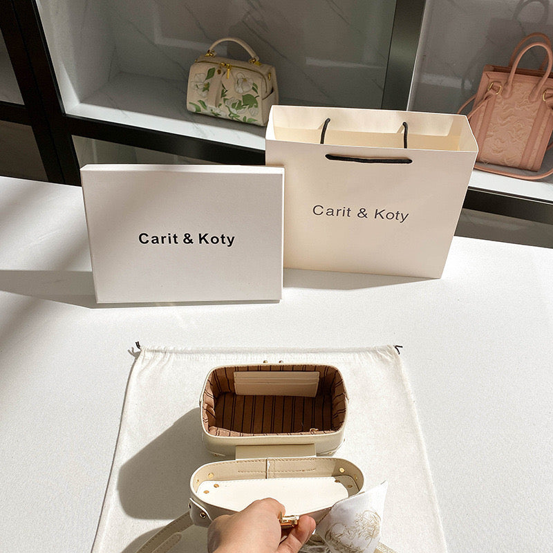 Carit & Koty Cream Embroidery Bag with Gold Lock