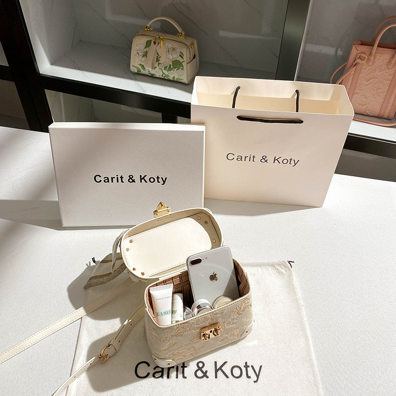 Carit & Koty Cream Embroidery Bag with Gold Lock