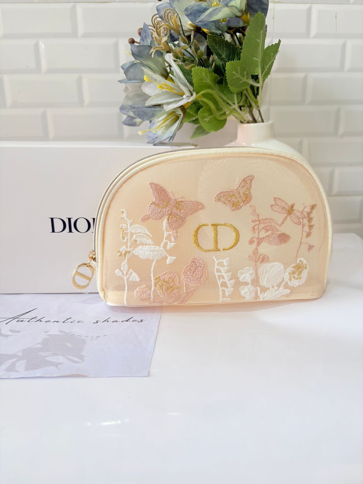 Dior butterfly mesh pouch